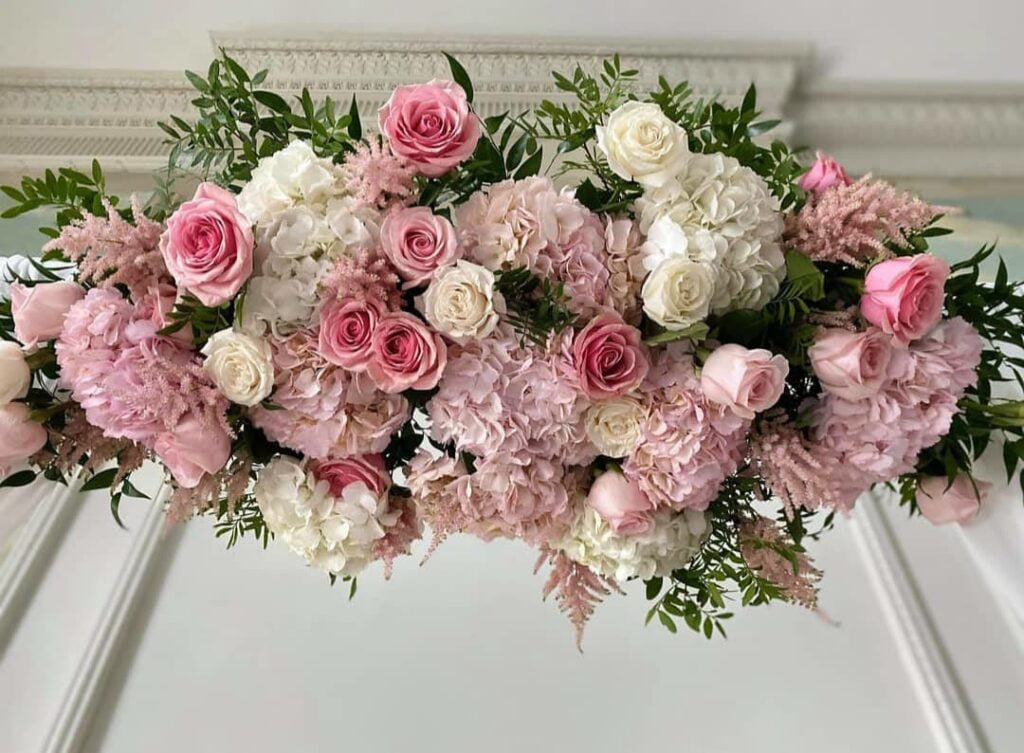A stunning bouquet of pink and white flowers by Sarah Melissa Designs